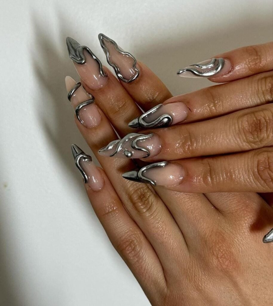12 Dazzling Silver Nail Art Ideas for Any Occasion 5 3D Silver Nails