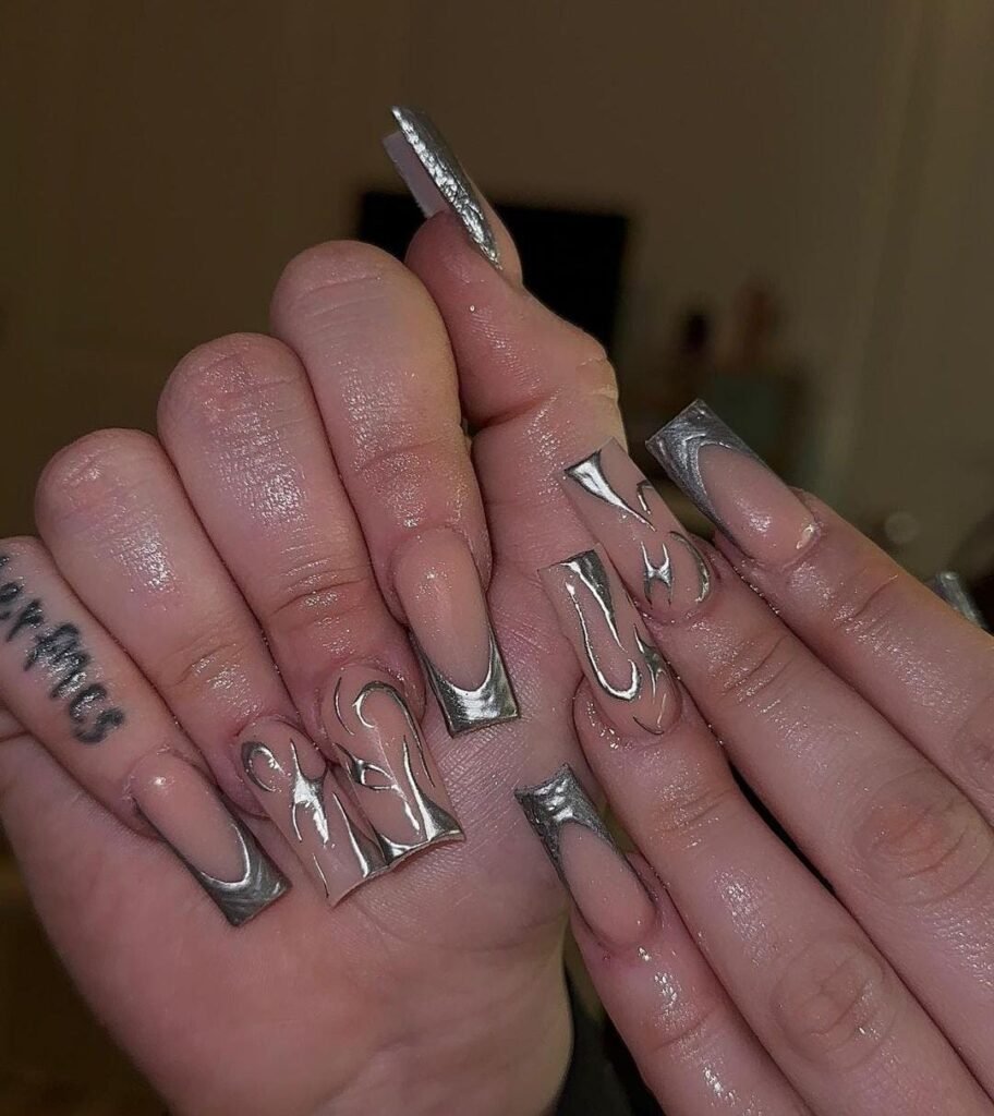 12 Dazzling Silver Nail Art Ideas for Any Occasion 1 Chrome Silver Nails