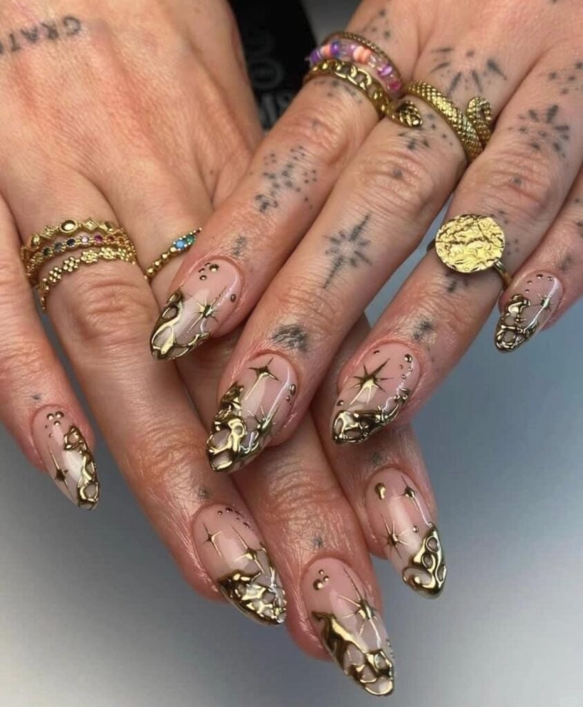 20+ Trendy Golden Nail Art Designs You’ll Love 4 Gold Cosmic Nails