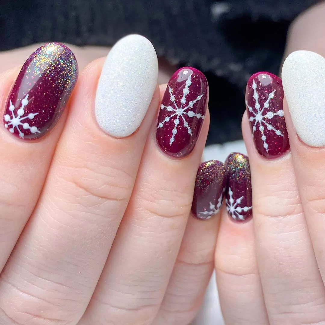 55+ Winter Nail Design Ideas 2025 13 Burgundy Snowflakes Winter Nails