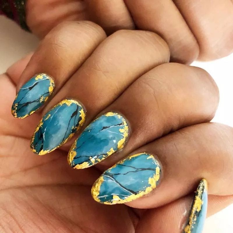 50 Stunning Almond Nail Ideas to Elevate Your Style 4 Almond-shaped nails with turquoise and gold design