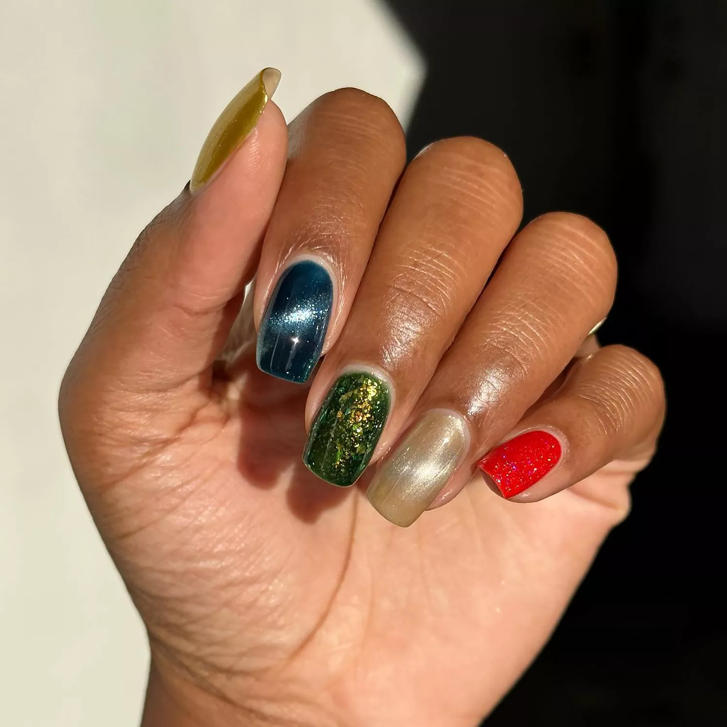 55+ Winter Nail Design Ideas 2025 18 A jewel-toned skittle manicure