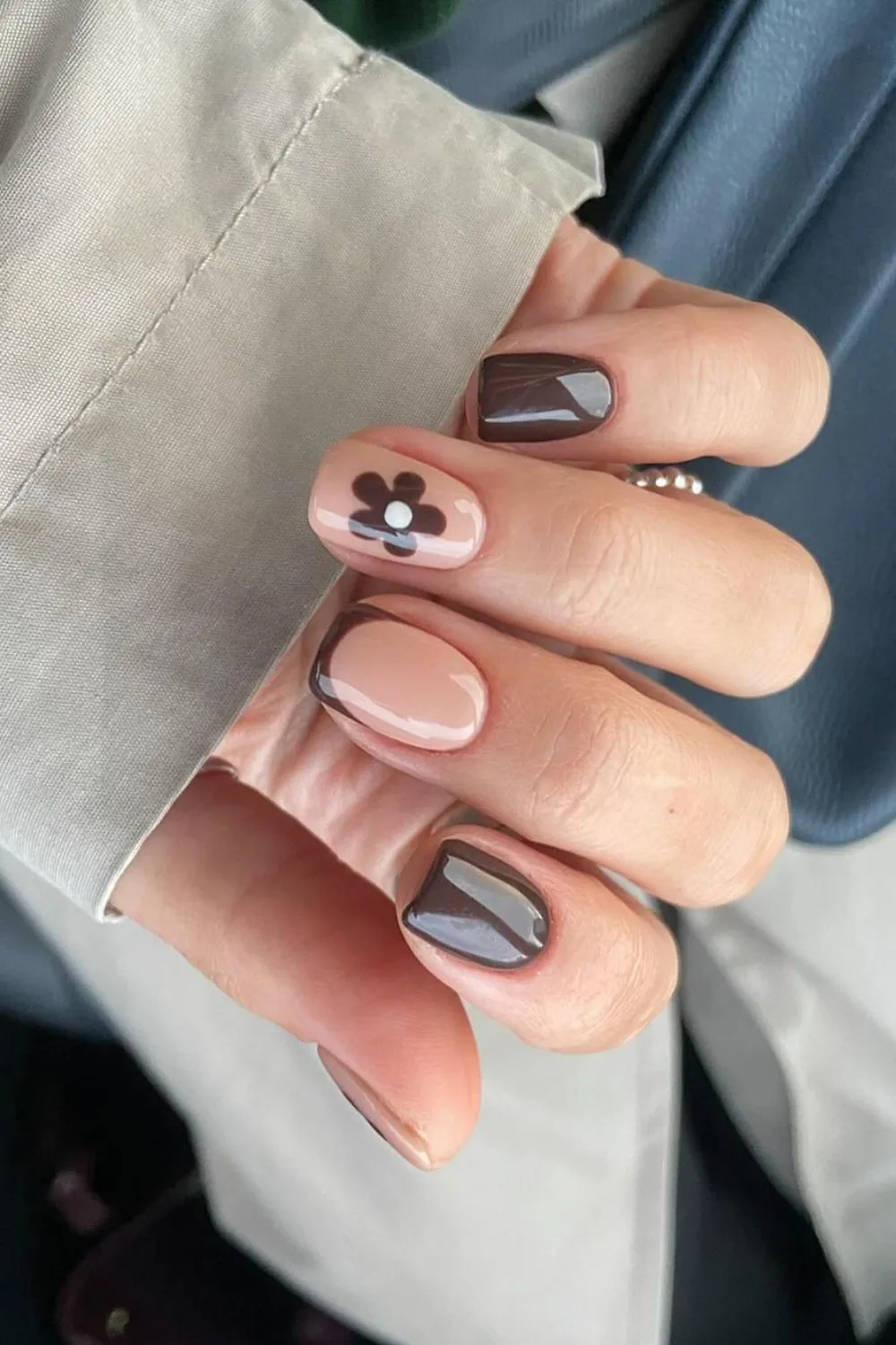 Dark brown nails with negative space and chunky flowers