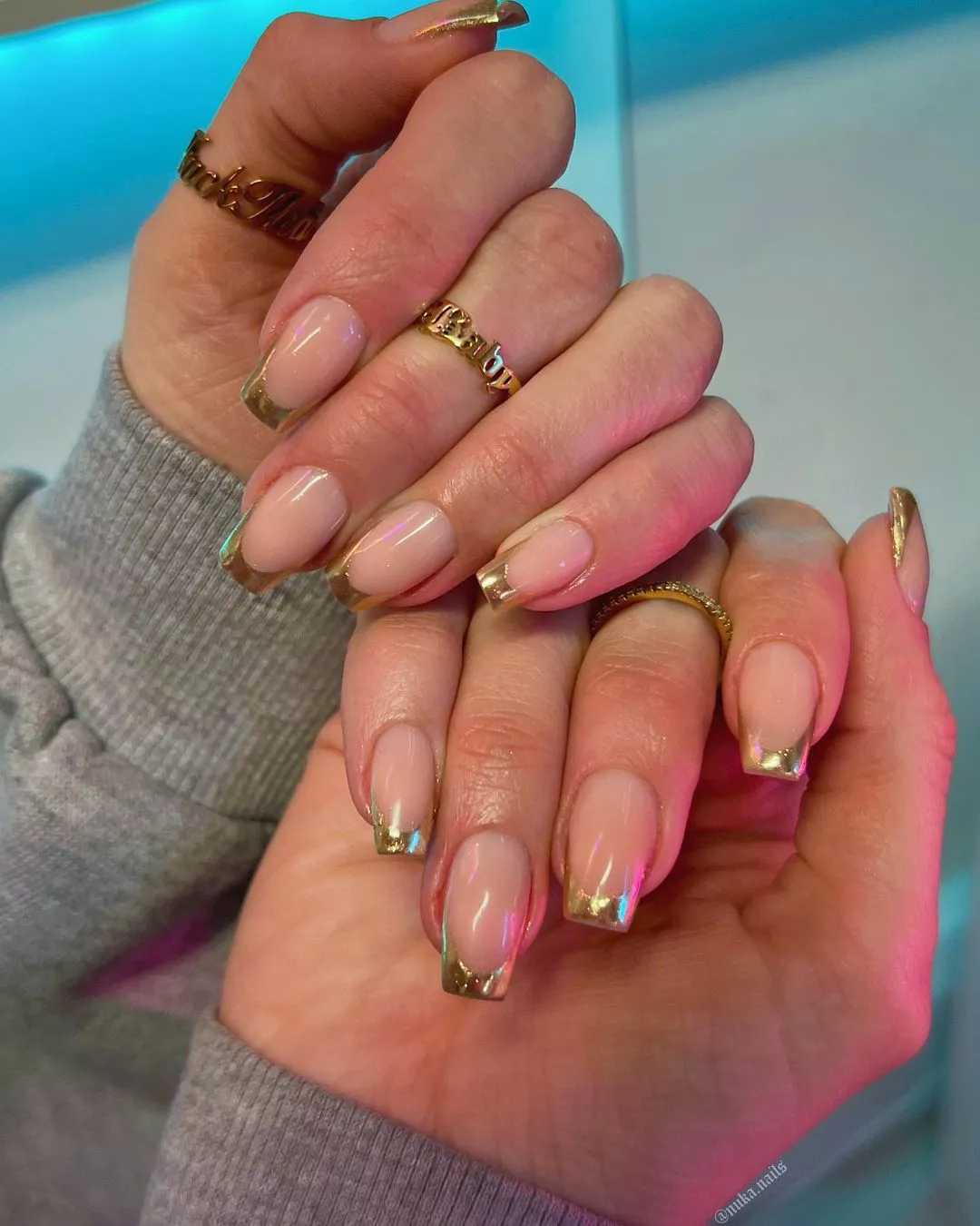 A chrome French manicure.