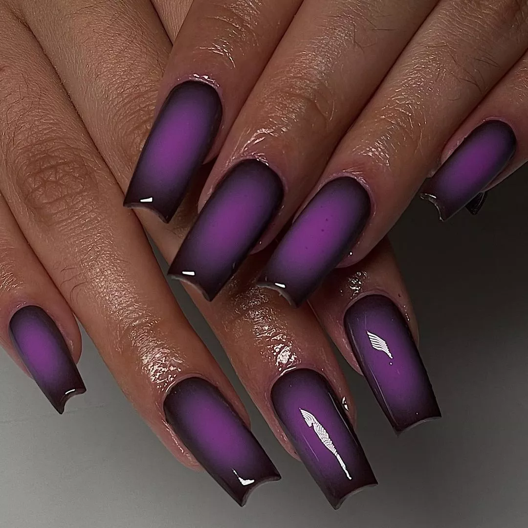 A moody aura manicure.