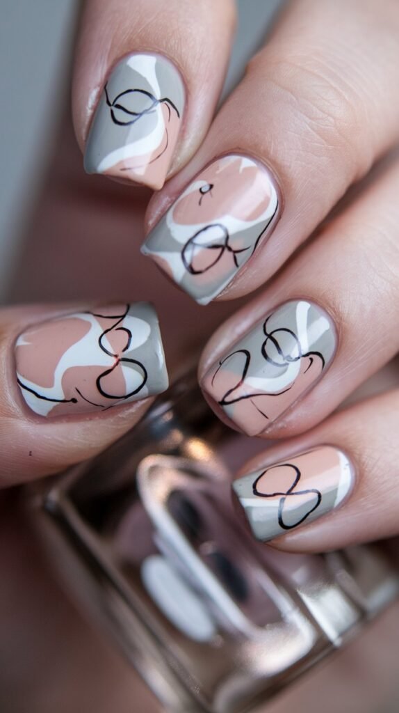 15 Simple Valentine’s Nail Designs for a Minimalist Look 11 a photo of a close up shot of nails with abstract YnrUSDK7Qfa1uaZnCmlRkA A O stgvTI2A1CbhQ8f3 A