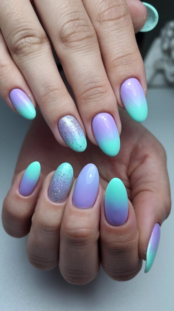 20 Stunning January Nail Ideas to Kickstart 2025 in Style 27 a photo of a hand with ombre winter pastel nails t tkKUjUR7SW2K373aXn zrQ Xf6xNmNwTBCuoIXZqRLfTA
