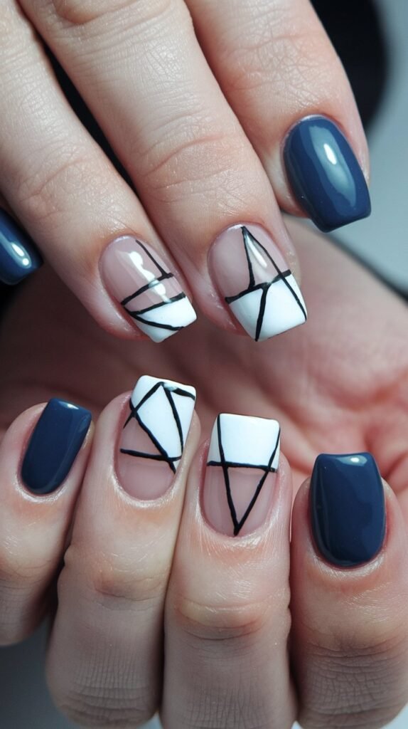 20 Stunning January Nail Ideas to Kickstart 2025 in Style 17 a photo of a manicure with geometric negative spac FMAhCUsuQEOAuR0DODd3hQ UnR PwjPT yhlgdorJElsg