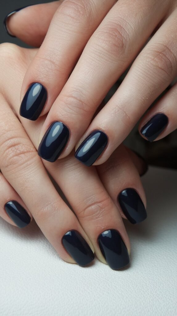 20 Stunning January Nail Ideas to Kickstart 2025 in Style 19 a photo of a woman with deep navy nails the nails 8ETY3LJ9STCAJi90HBkDbw eXdwuylVRKi2VzSSh c Og